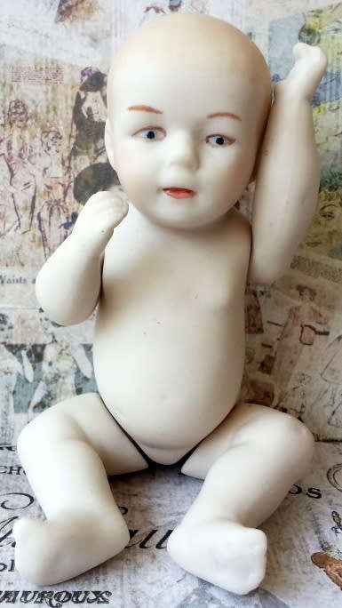 VINTAGE,  BISQUE MINI BABY DOLL WITH MOVING ARMS AND LEGS, NEEDING MOM TO SEW HIM / HER AN OUTFIT