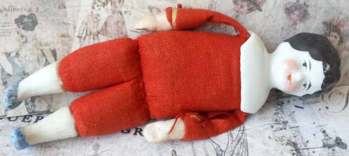 ANTIQUE,BLACK BERTHA SHOULDER HEAD, DOLL HOUSE DOLL,  WOOD FILLED BODY, BISQUE HEAD, HANDS AND FEET.