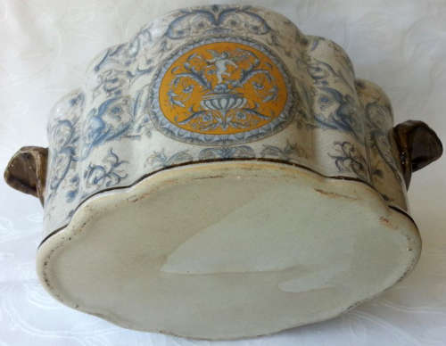 LARGE, HEAVY PORCELAIN, POT PLANT HOLDER WELL DECORATED WITH LEAVES, FLOWERS AND AN ANGEL OR TWO !!!