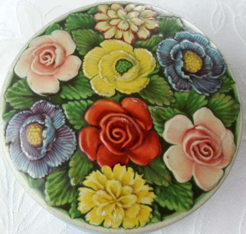 VINTAGE BISCUIT OR TOFFEE TIN, PRETTY EMBOSSED  WITH ROSES AND OTHER GARDEN FLOWERS