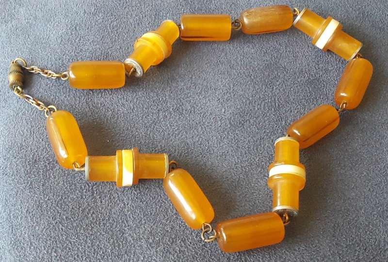 VINTAGE, HONEY COLOURED, BAKELITE   NECKLACE, OVAL  BEADS AND UNUSUAL TUBE LIKE BEADS
