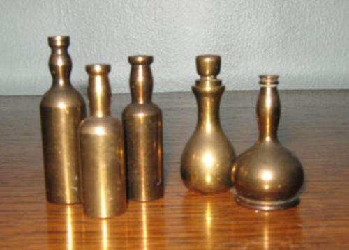ASSORTMENT OF BOTTLES     HEIGHTS  5cm,   4.3x2cm,   4.2cm,   4cm.