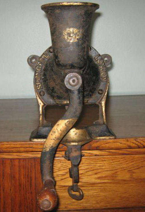 AN EARLY 20 TH,C, TABLE MOUNTED COFFEE GRINDER ,SPRONG & CO.