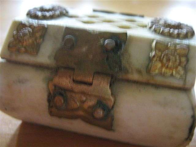 SMALL TRINKET BOX , MADE FROM BONE .LINED WITH FADED VELVET.