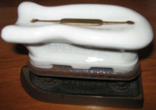 R1.00  RARE ANTIQUE, POSSIBLY 125 YEARS OLD,  BUGOLETTE, SAD IRON FOR COLLARS.