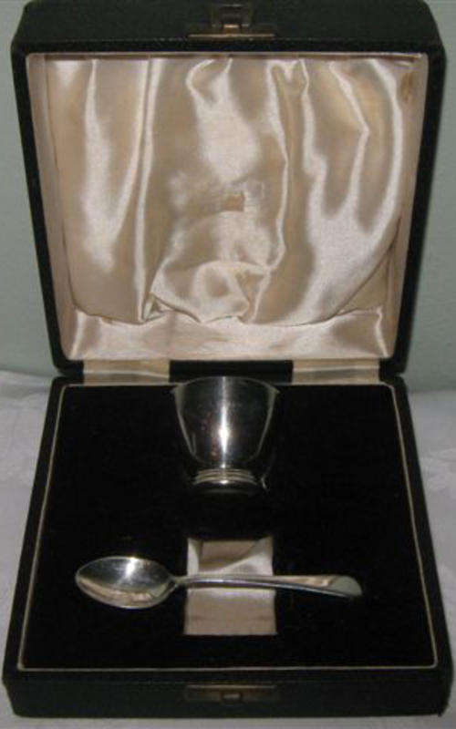 R1.00 E.P.N.S. BOXED, CHRISTENING EGG CUP AND SPOON, SERVIETTE RING MISSING.