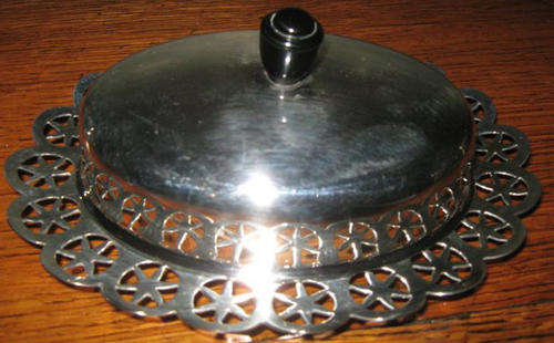 R1.00   E.P. OVAL SHAPED BUTTER DISH WITH FROSTED LINER IN PERFECT CONDITION