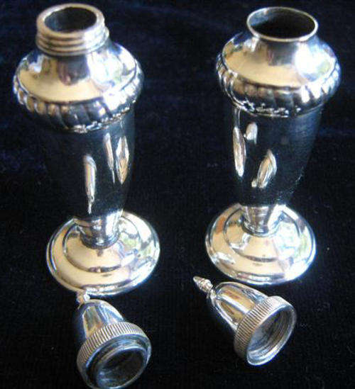 PAIR OF MATCHING, STERLING SILVER SALT POTS.