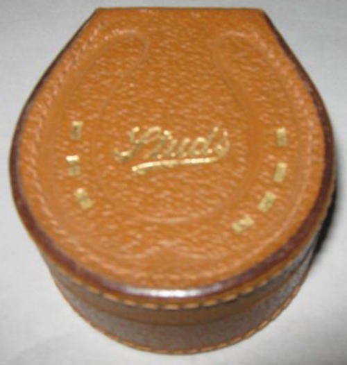R1.00  TAN COLOURED, HORSE SHOE SHAPE, LEATHER STUD BOX, MADE IN ENGLAND