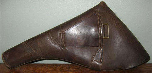 R1.00     VINTAGE, GENUINE LEATHER, GUN HOLSTER IN GOOD CONDITION.