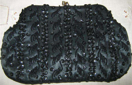 R1.00, FOR THIS BLACK, BEADED VINTAGE EVENING BAG IN GOOD CONDITION.