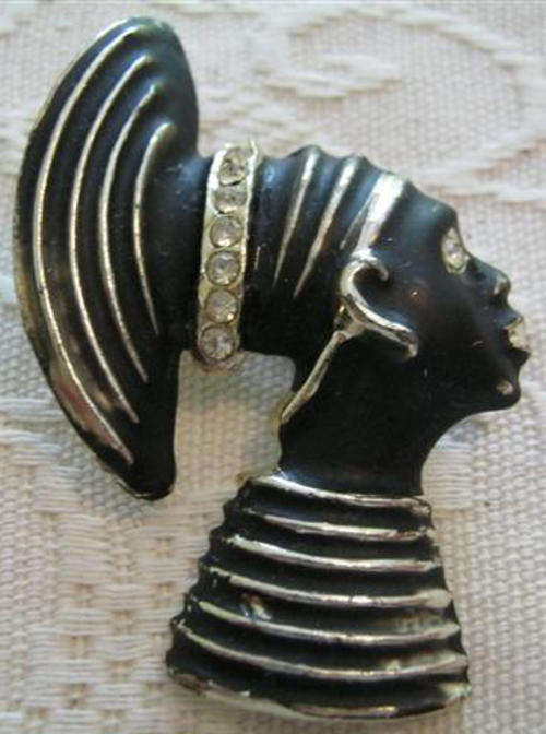 AFRICAN WOMAN, VINTAGE BROOCH WITH DIAMONTE DETAIL.