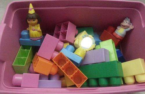 Pink crate  with 53 pieces of Mega Blocks