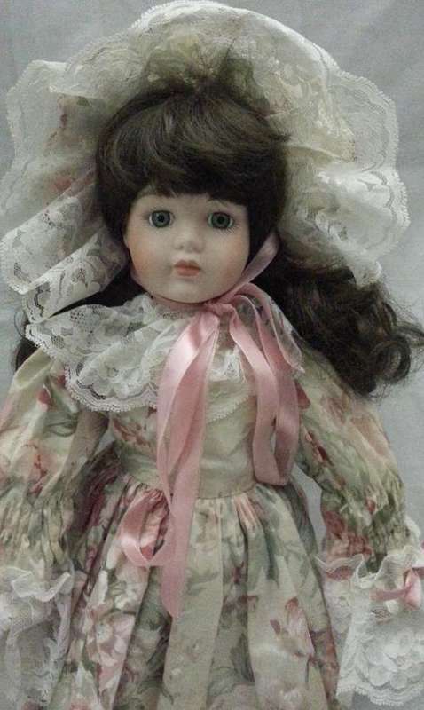 REALLY A STUNNING VINTAGE PORCELAIN DOLL TO ADD TO YOUR COLLECTION