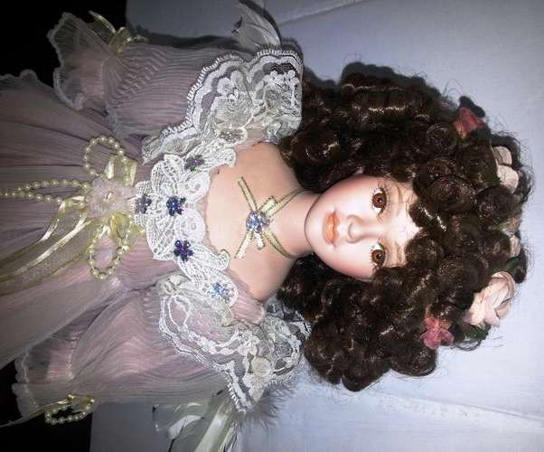 PORCELAIN DOLL THAT WOULD LOVE TO MAKE YOUR HOME HER HOME SHE IS 41CM TALL