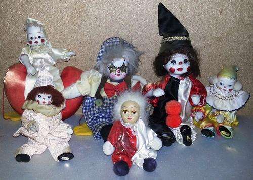 SET OF 6 PORCELAIN CLOWNS