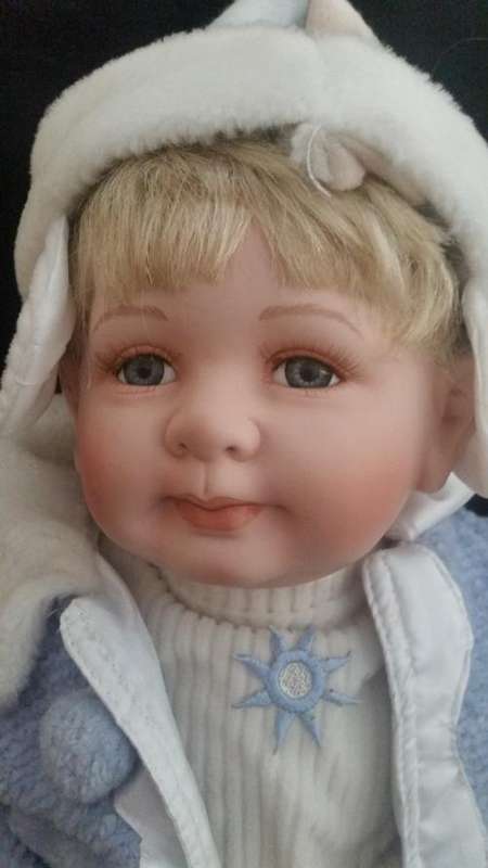 The cutest little boy in town porcelain doll