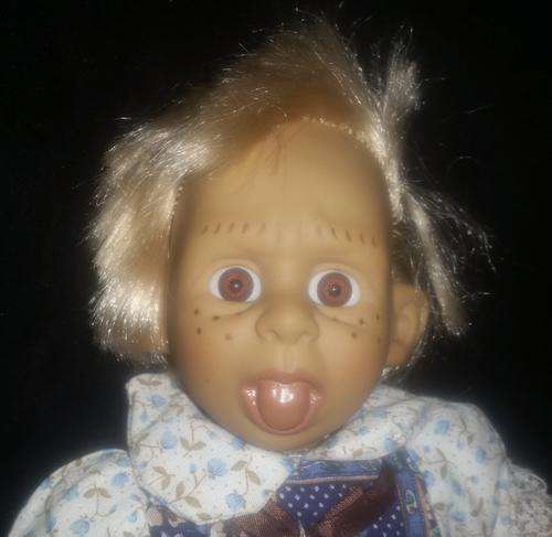 NOW ONLY A MOTHER CAN LOVE THIS FACE OF THIS DOLL