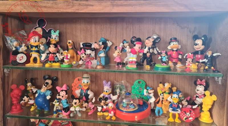 Large Lot Collection of Disney figurines, Does Not Include Display Cabinet