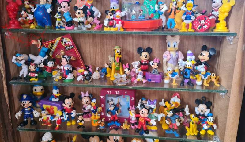 Large Lot Collection of Disney figurines, Does Not Include Display Cabinet