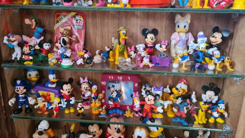 Large Lot Collection of Disney figurines, Does Not Include Display Cabinet