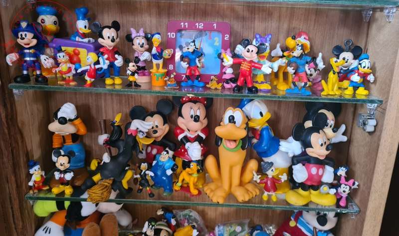 Large Lot Collection of Disney figurines, Does Not Include Display Cabinet