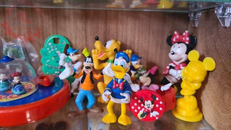 Large Lot Collection of Disney figurines, Does Not Include Display Cabinet