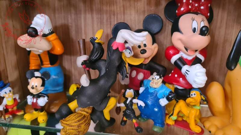 Large Lot Collection of Disney figurines, Does Not Include Display Cabinet