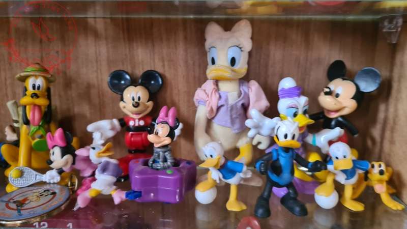 Large Lot Collection of Disney figurines, Does Not Include Display Cabinet