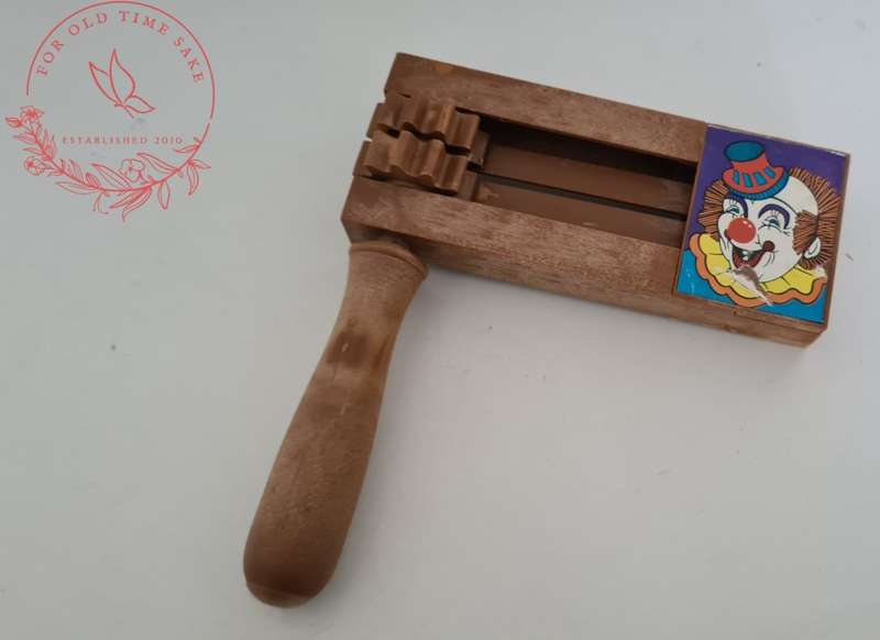 Vintage Noise Maker. Twirling Clown Noise Maker. Comfortable Handle