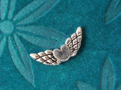 Winged heart charms, nickel. Sold individually