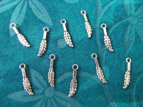 Leaf or feather charms X 10 as per picture