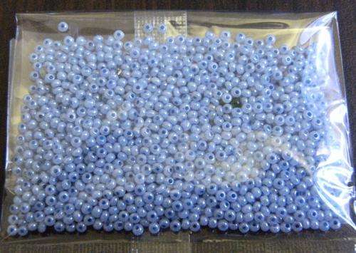 Seed beads, glass, light blue, shiny. 1mm diameter, 12 grams