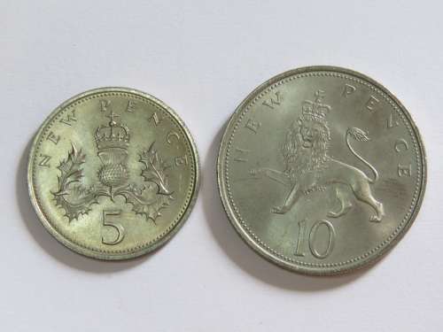Set of Britains first decimal coins in blue booklet