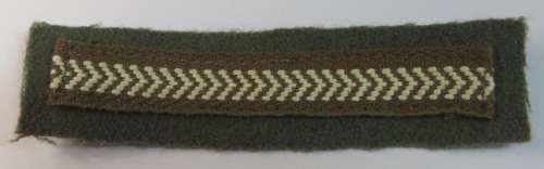 S.W.A corporal stripe on green backing