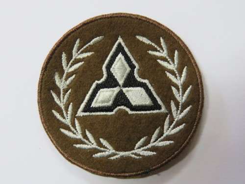 SWA  Territorial Force Regimental Sergeant arm badge (Silver and black on brown cotton)
