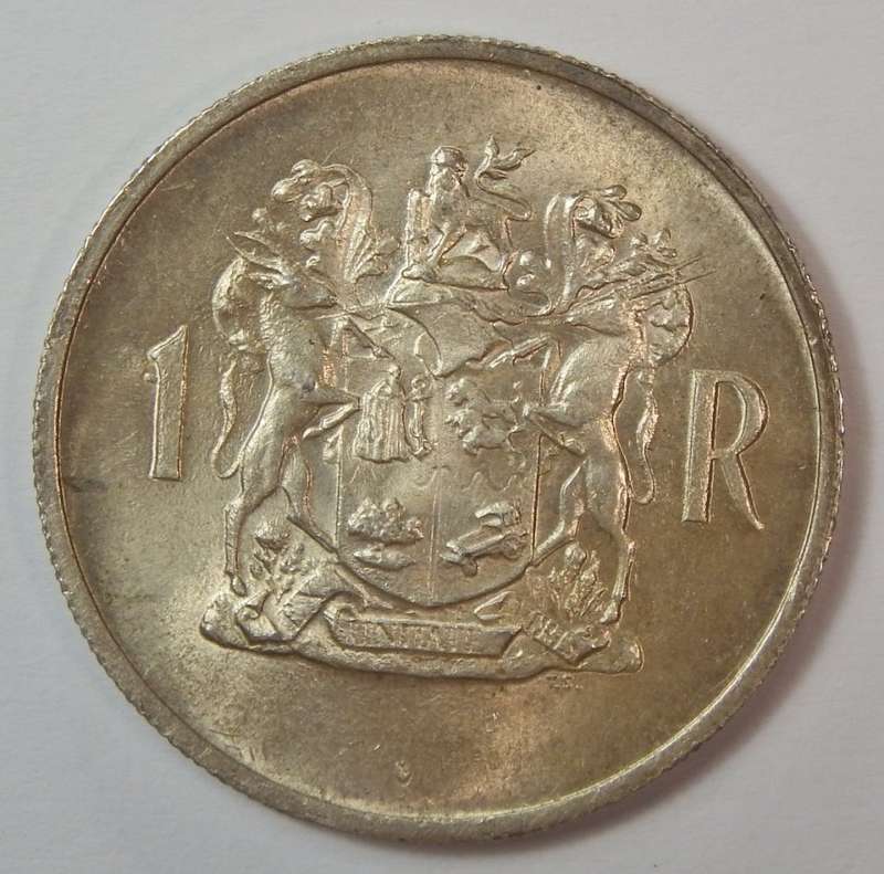 1969 RSA silver rand wiith metal intrusion to left of 1