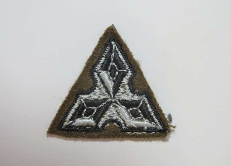 Territory force adjutant officer class 2 brown cloth with black and white stitching