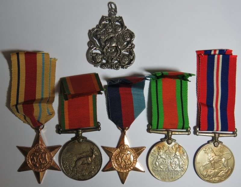Set of 5 WW2 medals issued to G.F.J. Myburgh as well as large pendant brought back from Egypt
