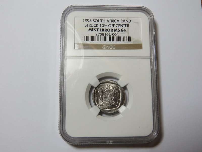 South Africa error coin - 1995 Rand struck off center and Graded Mint error MS 64 by NGC
