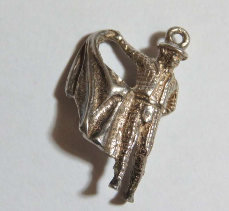 Silver Matador charm