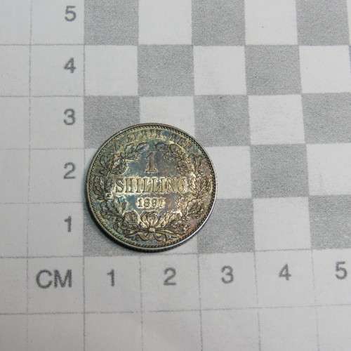 1897 ZAR Kruger one shilling with lovely rainbow toning