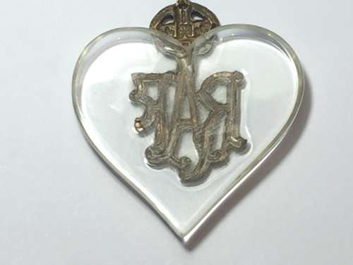 RAF badge made into a love token on a piece of perspex ( airplane window )