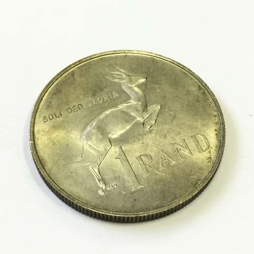 1967 RSA silver R1 with large flaw through front legs of springbok