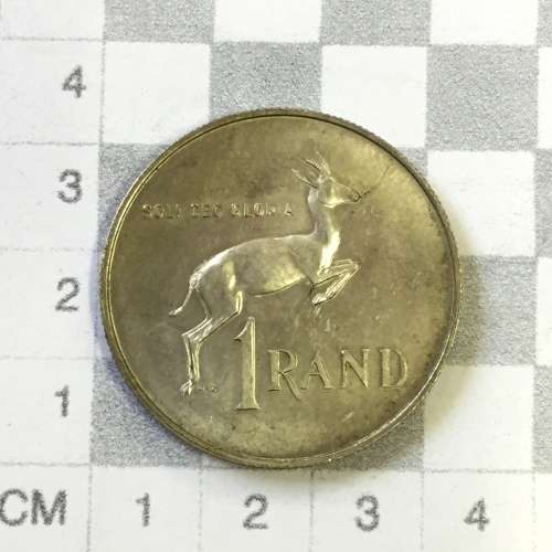 1967 RSA silver R1 with large flaw through front legs of springbok