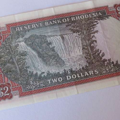 Reserve Bank of Rhodesia Two Dollars 5 August 1977 - Uncirculated with two vertical dents
