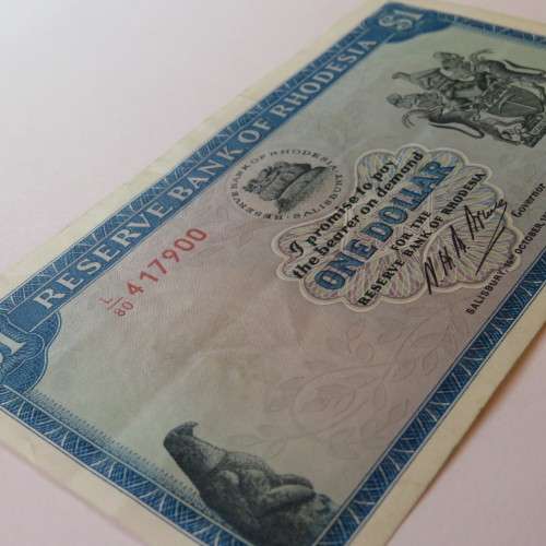 Reserve Bank of Rhodesia One Dollar 15 October 1974 AU with centre horizontal fold