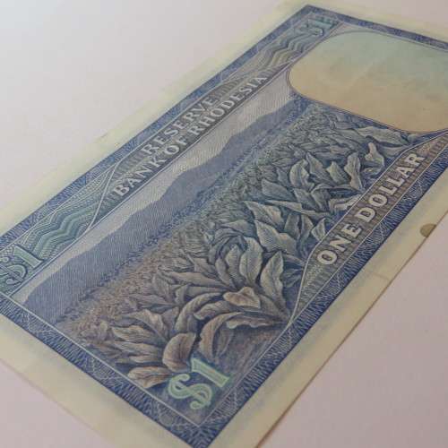 Reserve Bank of Rhodesia One Dollar 13 October 1974 uncirculated with stains on lower rim of note