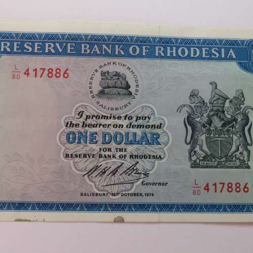 Reserve Bank of Rhodesia One Dollar 13 October 1974 uncirculated with stains on lower rim of note