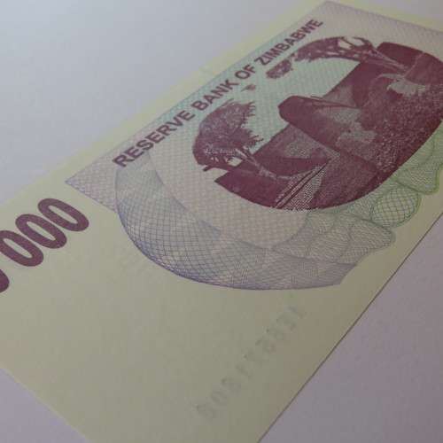 Zimbabwe Bearer cheque 1/8/2006 $10000 uncirculated 10000 with space after 10 AE 8571808